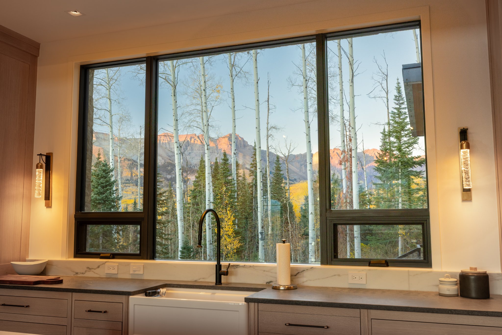 Kitchen — panoramic window, mountain views at dusk