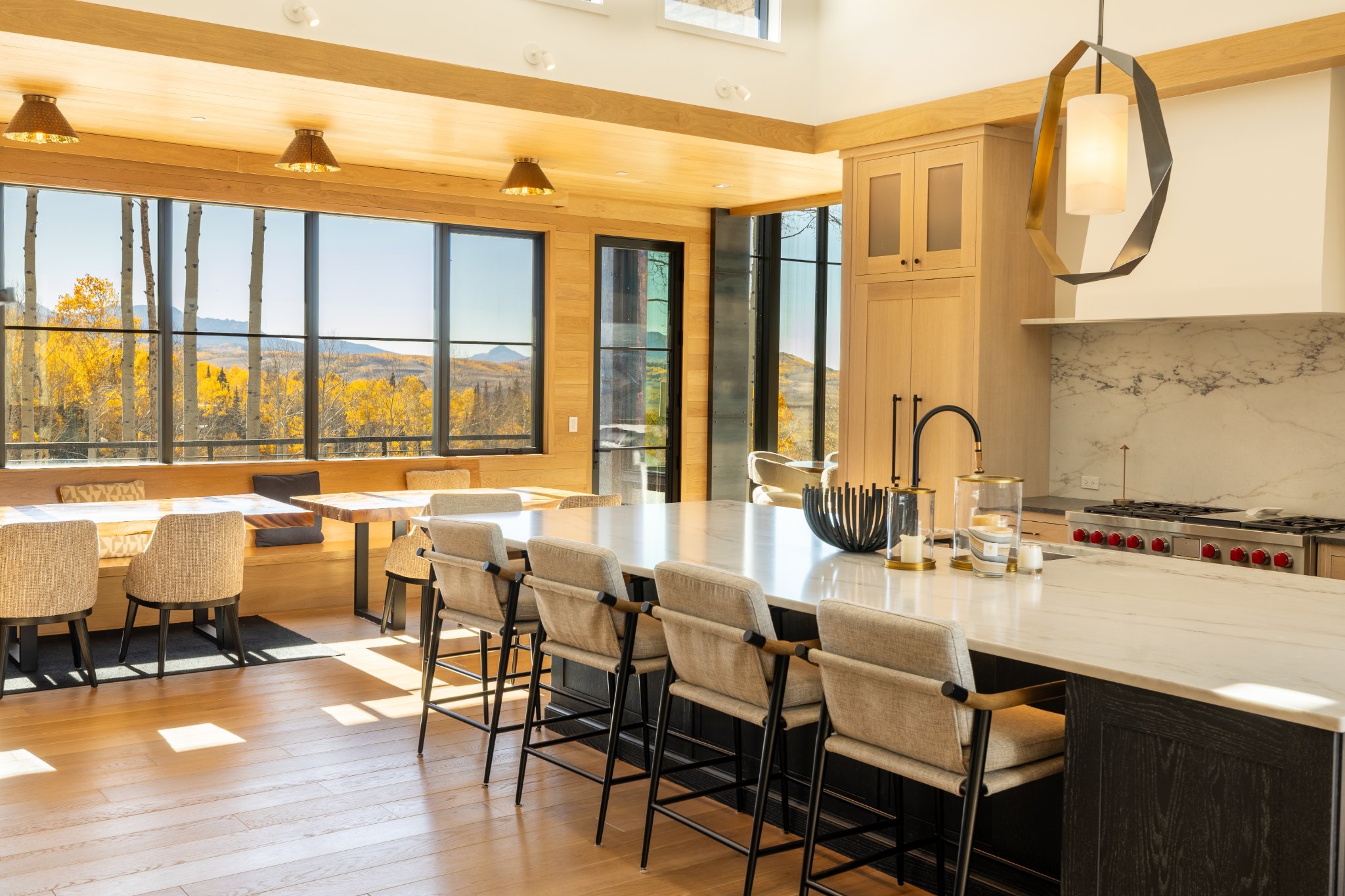 Kitchen — oversized island, chef-grade appliances, mountain views